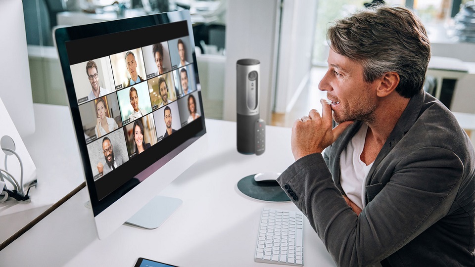 zoom video conferencing online meeting remote workers one user connected via laptop with a grid of twelve participants on screen 2400x1600 100837446 large